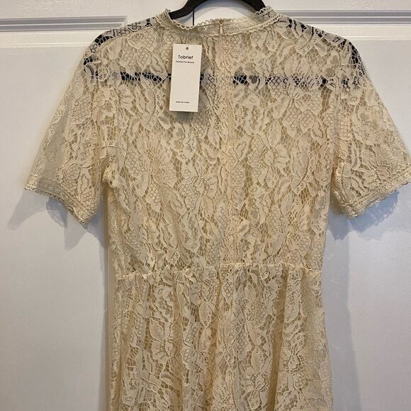 Tobrief Tops - Lace peplum top 